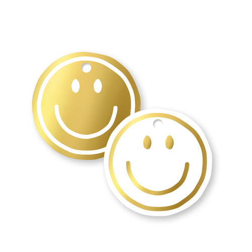 Dubbelzijdig cadeaulabel met een wit met gouden smiley