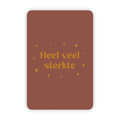 Wenskaart met de tekst heel veel sterkte en hartjes in goudfolie